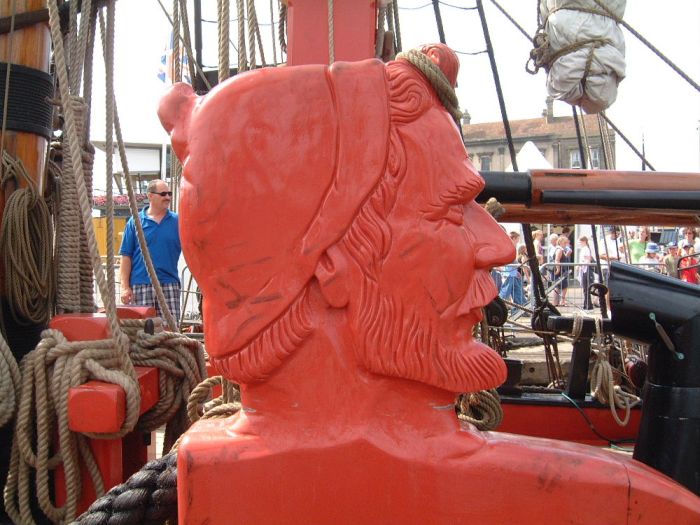 Carving on winch HM Bark Endeavour