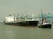 Tugs assisting large bulk carrier